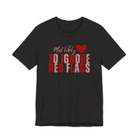 Most Likely to Ignore Red Flags T-Shirt — Funny Valentine’s Day Graphic Tee