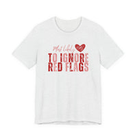 Most Likely to Ignore Red Flags T-Shirt — Funny Valentine’s Day Graphic Tee