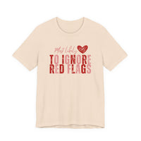 Most Likely to Ignore Red Flags T-Shirt — Funny Valentine’s Day Graphic Tee